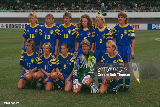 Members of the Sweden football squad posed together prior to playing in a group B match during the 1991 FIFA Women's World Cup tournament in China in...