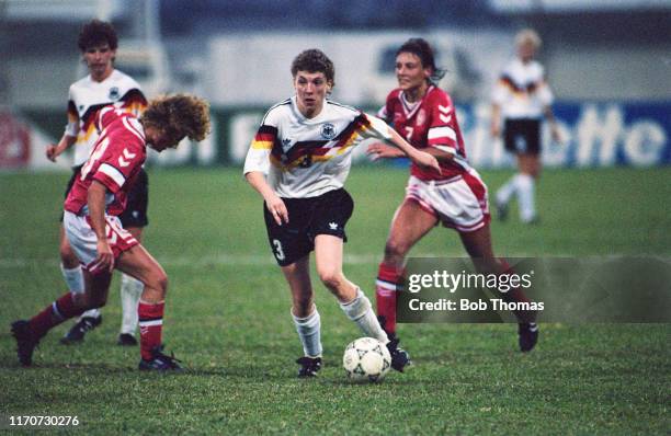 Birgitt Austermuhl of Germany makes a run with the ball during play in the 1991 FIFA Women's World Cup quarter final match between Germany and...