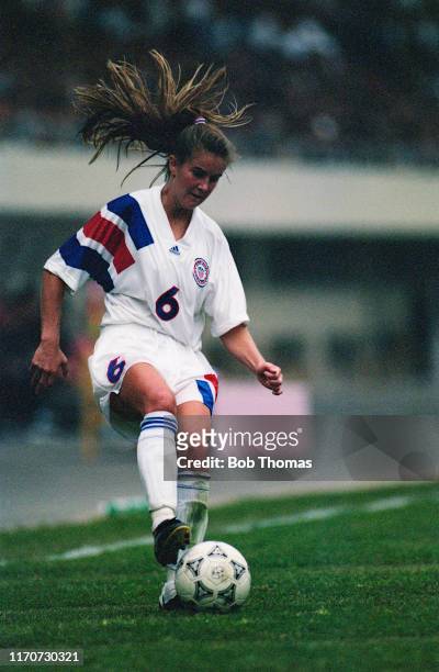 Brandi Chastain of the United States with the ball during play in the 1991 FIFA Women's World Cup group B match between Japan and the United States...