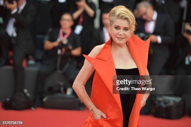 Catherine Deneuve walks the red carpet ahead of the Opening Ceremony and the "La Vérité" screening during the 76th Venice Film Festival at Sala...