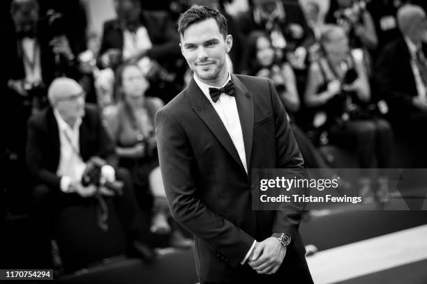 Nicholas Hoult wearing a Jaeger-LeCoultre watch walks the red carpet ahead of the Opening Ceremony and the "La Vérité" screening during the 76th...