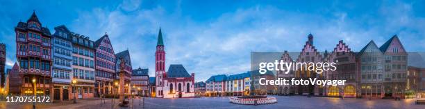 frankfurt romerberg illuminated dusk romer town hall altstadt panorama germany - rathaus stock pictures, royalty-free photos & images