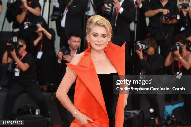 Catherine Deneuve walks the red carpet ahead of the opening ceremony during the 76th Venice Film Festival at Sala Casino on August 28, 2019 in...