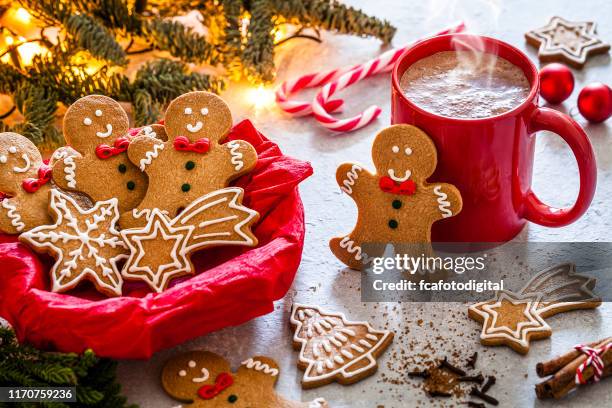 homemade hot chocolate mug and christmas cookies on christmas table - hot chocolate stock pictures, royalty-free photos & images