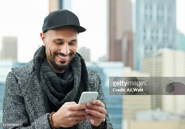 always making new connections - handsome muslim men stock pictures, royalty-free photos & images