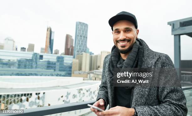 walking in the city - handsome muslim men stock pictures, royalty-free photos & images