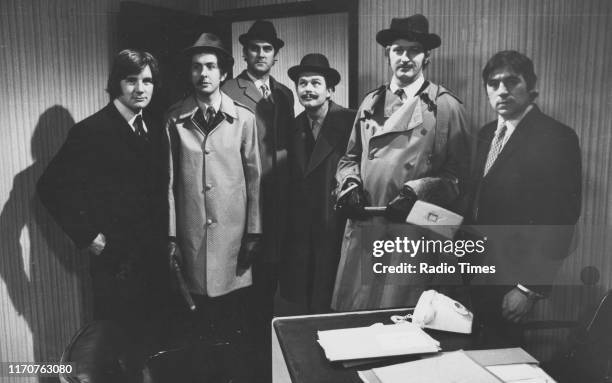 Comedians Michael Palin, Eric Idle, John Cleese, Terry Gilliam, Graham Chapman and Terry Jones in a sketch from the BBC television series 'Monty...