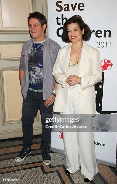 Spanish singer Alejandro Sanz and Bianca Jagger attend "Save the Children" awards press conference at "Casa de America" on June 21, 2011 in Madrid,...