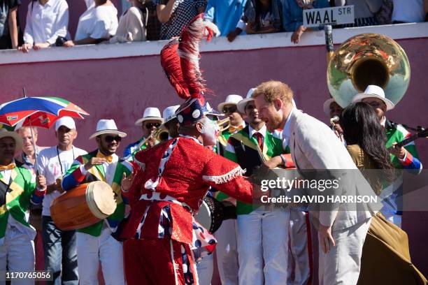 Prince Harry , Duke of Sussex and Meghan Duchess of Sussex meet musicians as they visit the oldest mosque of Cape Town in Dorp Street in Bo Kaap...