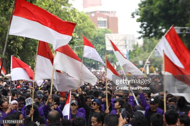Thousand Indonesian students hold a protest against the government's proposed change in criminal code laws and plans to weaken the anti-corruption...