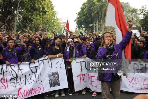 Thousand Indonesian students hold a protest against the government's proposed change in criminal code laws and plans to weaken the anti-corruption...