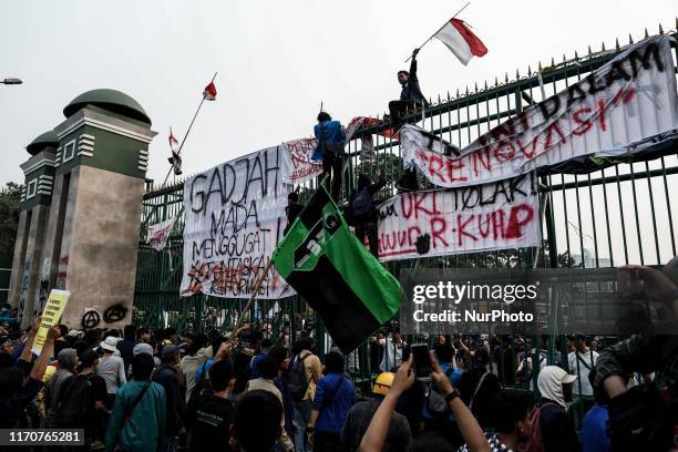 University students protest outside the Indonesian Parliament in Jakarta, Indonesia, September 24, 2019. Thousands of students staged protests across...