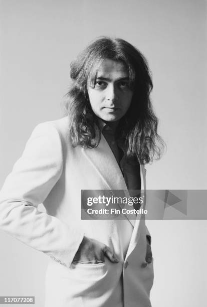Bernie Marsden, guitarist with British rock band Whitesnake, wearing a light jacket and posing for studio portrait in Camden, London, England, Great...