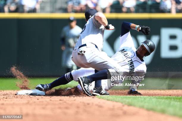 Keon Broxton of the Seattle Mariners is forced trying to steal second base by DJ LeMahieu of the New York Yankees in the fourth inning during their...