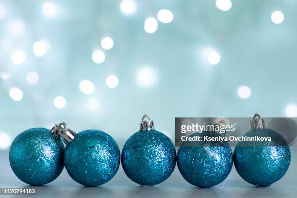 christmas blue decorations on snow background. - blue baubles stock pictures, royalty-free photos & images