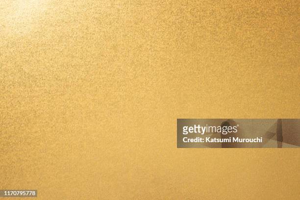 metallic gold background - foil foto e immagini stock