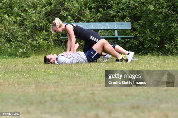 Chloe Madeley and Sam Attwater are seen training for the Virgin Triathlon on June 13, 2011 near Guildford, England.