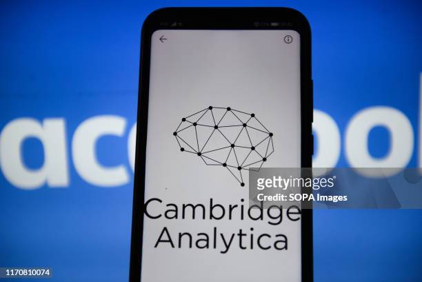 In this photo illustration a Cambridge Analytica logo seen displayed on a smartphone.