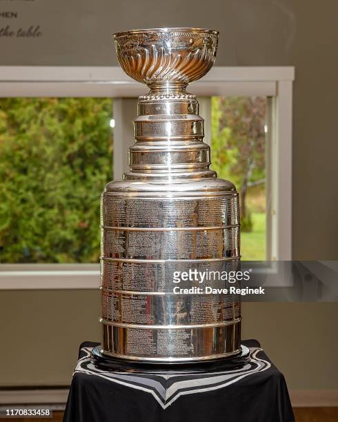 Residents of the Grandview Senior Home gather with the Stanley Cup prior to the Kraft Hockeyville game between the Detroit Red Wings and the St....