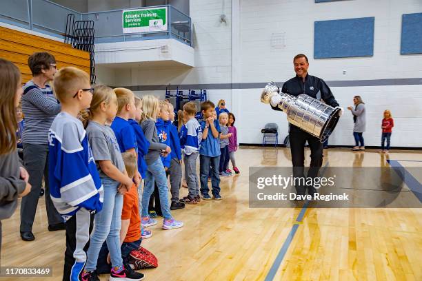 Kids from the Calumet Elementary School get to see the Stanley Cup prior to the Kraft Hockeyville game between the Detroit Red Wings and the St....