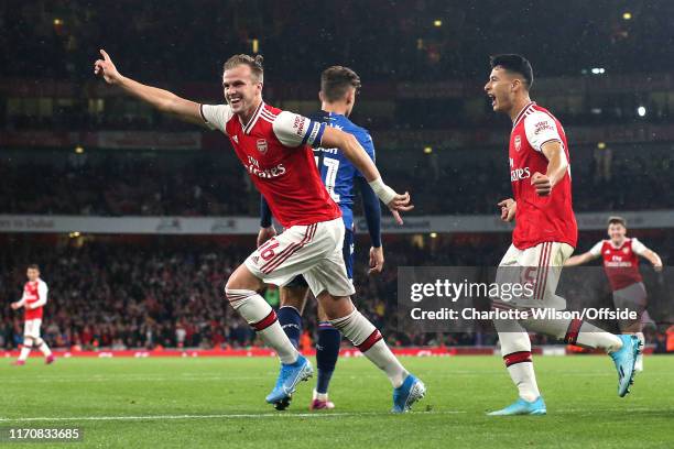 Rob Holding of Arsenal celebrates scoring their 2nd goal during the Carabao Cup Third Round match between Arsenal and Nottingham Forest at Emirates...