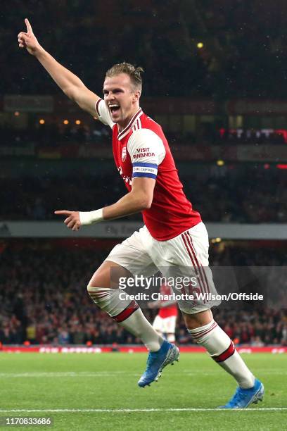Rob Holding of Arsenal celebrates scoring their 2nd goal during the Carabao Cup Third Round match between Arsenal and Nottingham Forest at Emirates...