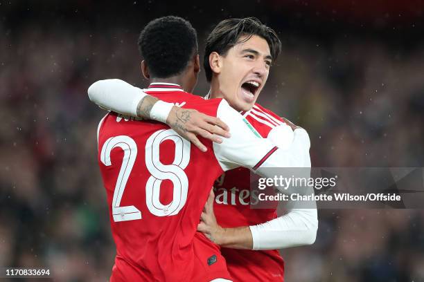 Hector Bellerin of Arsenal celebrates their 3rd goal with scorer Joe Willock during the Carabao Cup Third Round match between Arsenal and Nottingham...