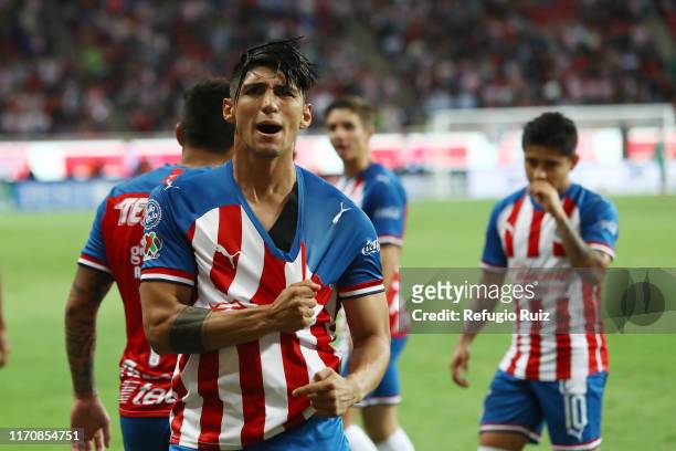Alan Pulido of Chivas celebrates after scoring the second goal of his team during the 11th round match between Chivas and Pachuca as part of the...