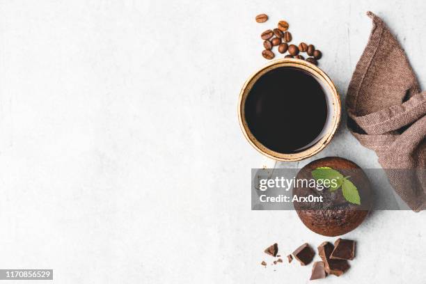 chocolate muffin and cup of black coffee - cake from above stock pictures, royalty-free photos & images