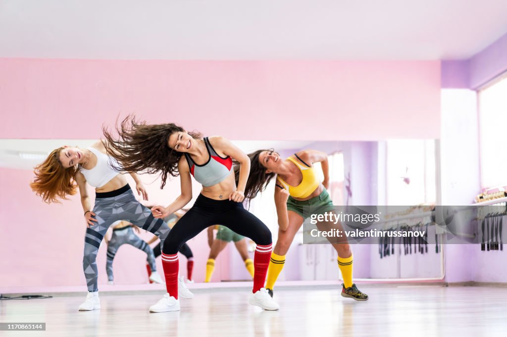 Professional dancer class dancing in dancing studio