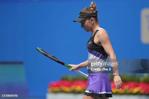 Simona halep of Romania leaves the court after retiring match against Elena Rybakina of Kazakhstan on Day 4 of 2019 Dongfeng Motor Wuhan Open at...