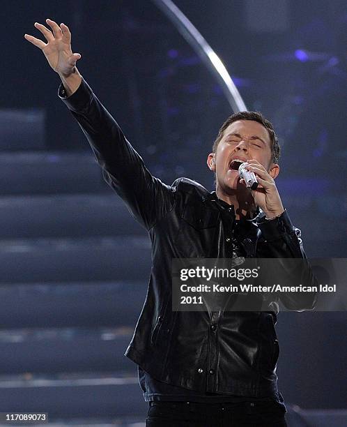 Singer Scotty McCreery performs onstage during Fox's "American Idol 2011" finale results show held at Nokia Theatre LA Live on May 25, 2011 in Los...