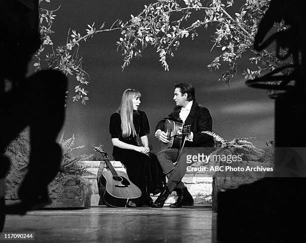 Joni Mitchell and Johnny Cash perform on the TV show 'The Johnny Cash Show', airdate: June 7, 1969.