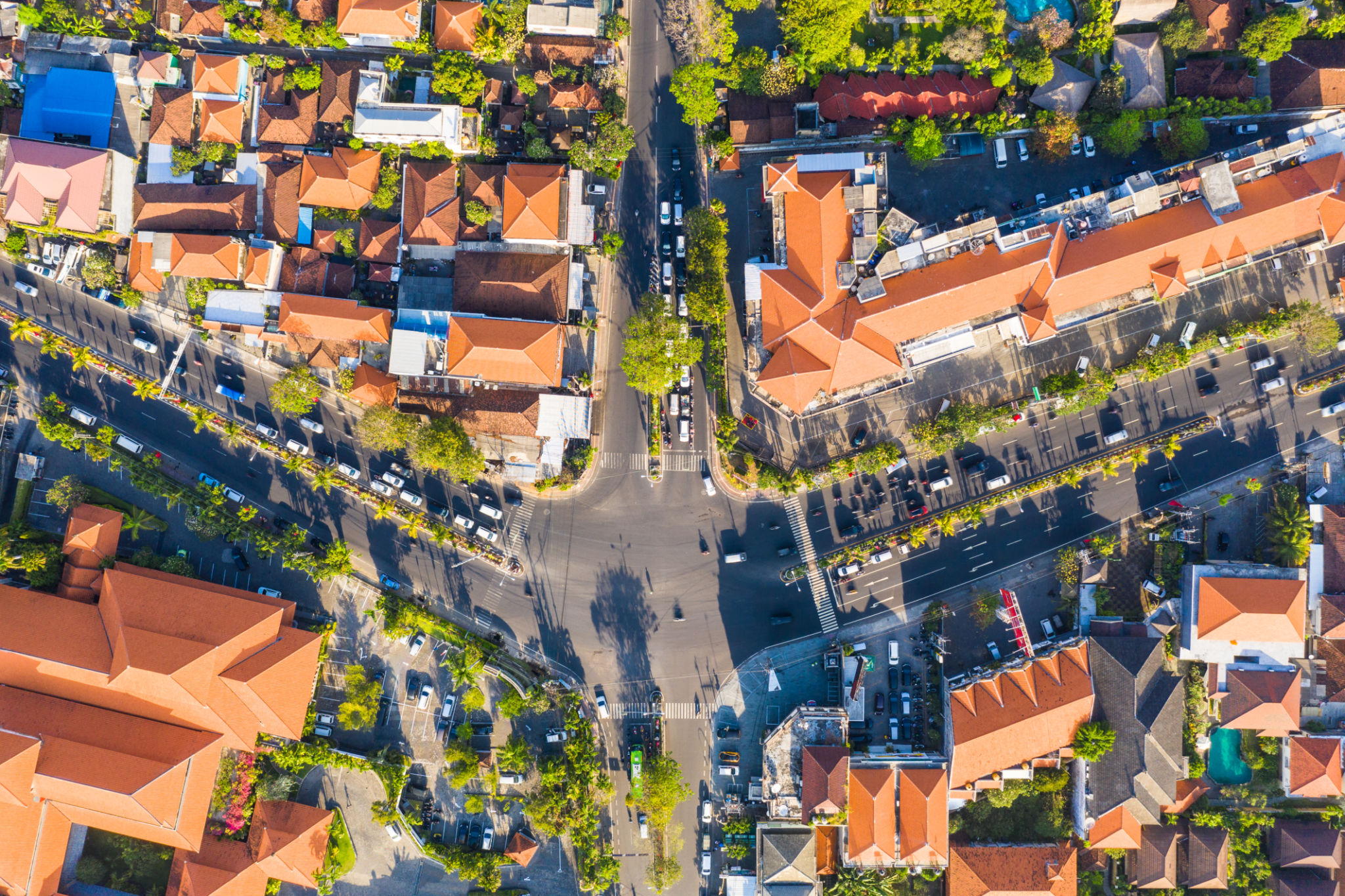 Top down view of a crowded road intersection in the Ungasan area of the Bukit Peninsula in Bali, Indonesia Top down view of a crowded road intersection in the Ungasan area of the Bukit Peninsula in Bali, Indonesia