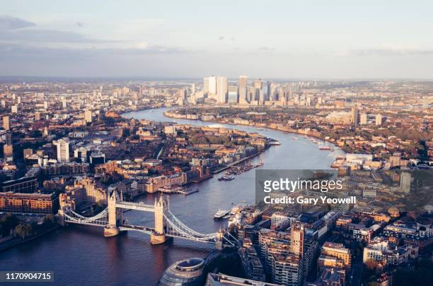 elevated view over london city skyline at sunset - england photos et images de collection