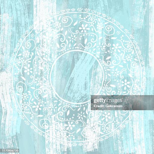 coastal frame background with white lace stencil on shabby blue wood wall. shabby wooden blue background. grunge texture, painted surface. coastal background. - white table texture stock illustrations