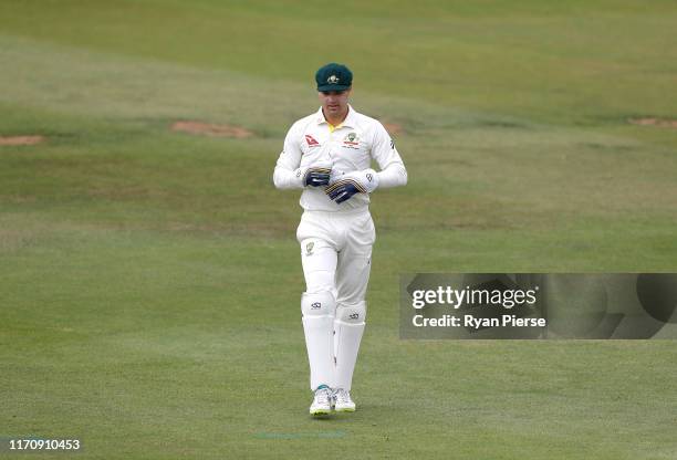 Alex Carey of Australia keeps wicket during day one of the Tour Match between Derbyshire CCC and Australia at The County Ground on August 29, 2019 in...