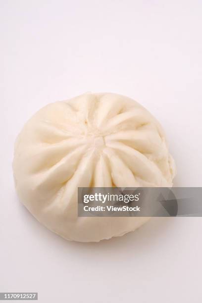 the steamed stuffed bun - chinese steamed bun stock-fotos und bilder