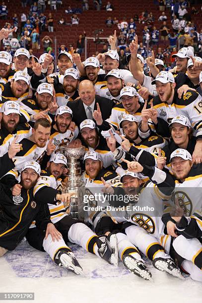 Team photo of Boston Bruins victorious with Stanley Cup trophy after win vs Vancouver Canucks at Rogers Arena. Game 7. Vancouver, Canada 6/15/2011...