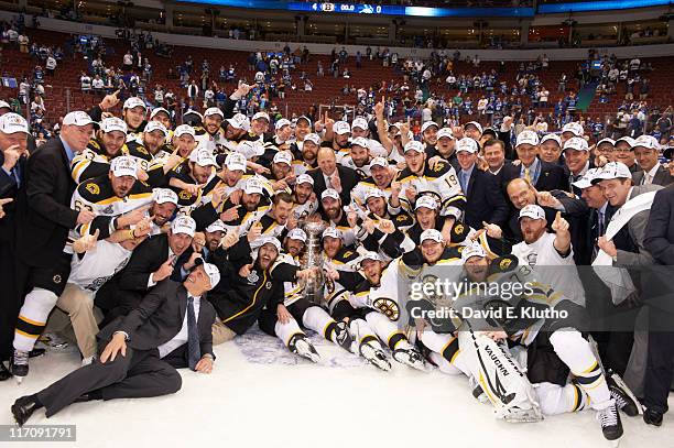 Team photo of Boston Bruins victorious with Stanley Cup trophy after win vs Vancouver Canucks at Rogers Arena. Game 7. Vancouver, Canada 6/15/2011...
