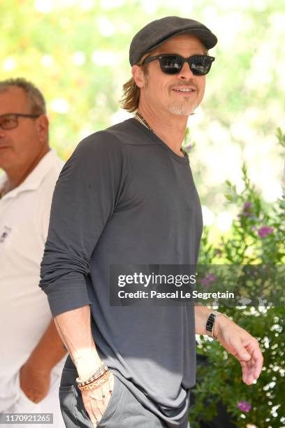 Brad Pitt departs after the "Ad Astra" Photocall at the 76th Venice Film Festival on August 29, 2019 in Venice, Italy.