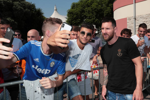 Champions League Forward of the Season 2018/19 Nominee, Lionel Messi of FC Barcelona poses for a selfie with a fan prior to the UEFA European Club...