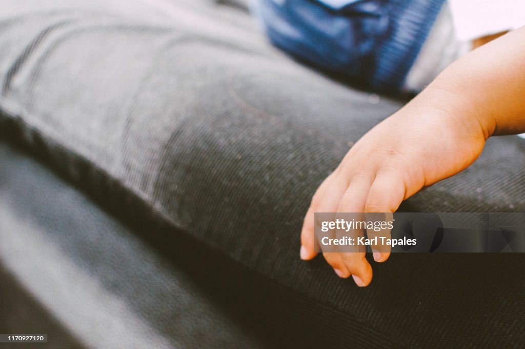 A toddler is sleeping in the car