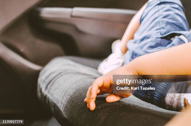 a toddler is sleeping in the car - infant death stock pictures, royalty-free photos & images