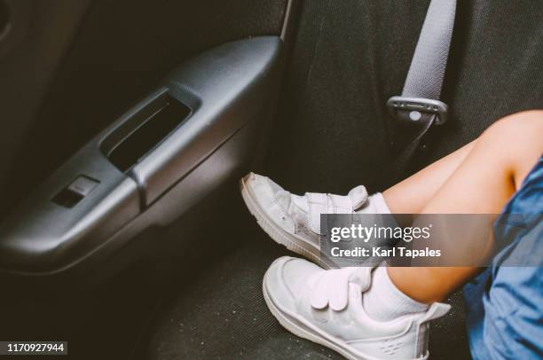 a toddler is sleeping in the car - hot boy pics stockfoto's en -beelden