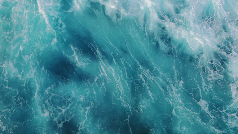 https://media.gettyimages.com/id/1170947236/video/drone-view-of-the-ocean-waves-splashing.jpg?b=1&s=640x640&k=20&c=E26TQJhFJMatApuiI3hd9cnw-vpYt9R9XF-lSYqkDdk=