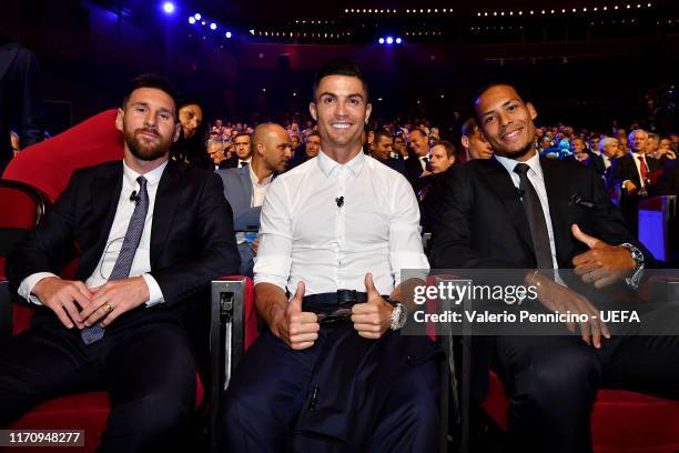 Lionel Messi of FC Barcelona, Cristiano Ronaldo of Juventus and Virgil van Dijk of Liverpool pose for a photo during the UEFA Champions League Draw,...