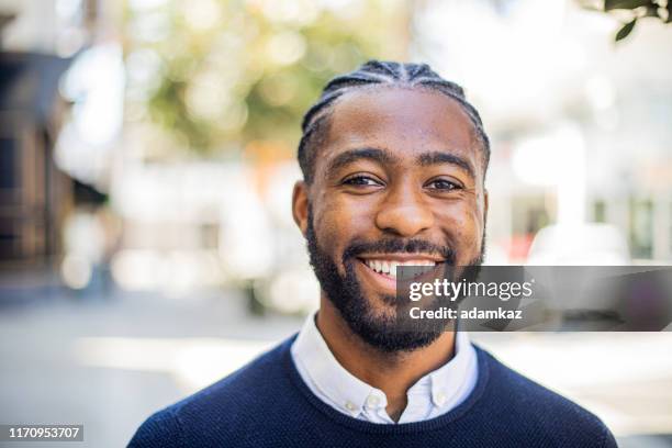 smiling black man - testimonial portrait smile stock pictures, royalty-free photos & images