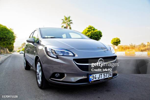 opel corsa parking on highway. - opel corsa stock pictures, royalty-free photos & images