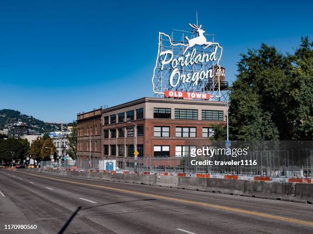 white stag sign in portland, oregon - portland neon sign stock pictures, royalty-free photos & images